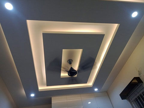 stylish ceiling architecture in mangalore with LED lighting, designed by best interior designers to enhance the room's elegnce 