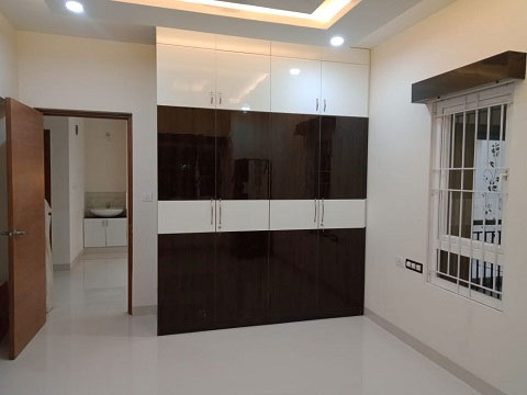 luxurious interior wardrobe in mangalore showcasing a modern,built-in design by expert interior designers for stylish storage  